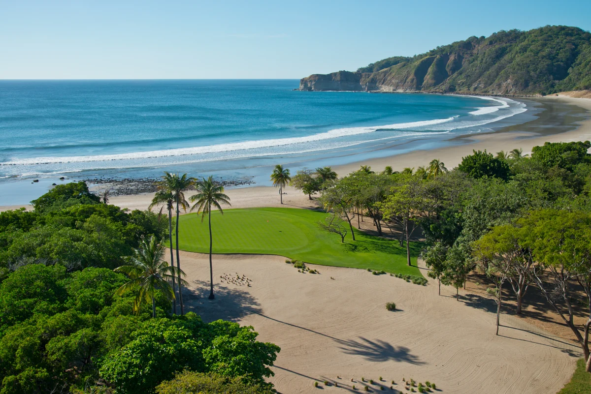 Guacalito golf green beside the Pacific coast