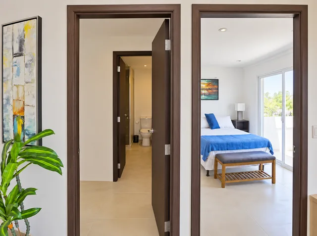 Interior hallway connecting the bedroom and bathroom