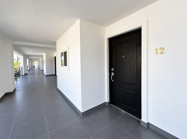 Open-air corridor outside the condo entrance