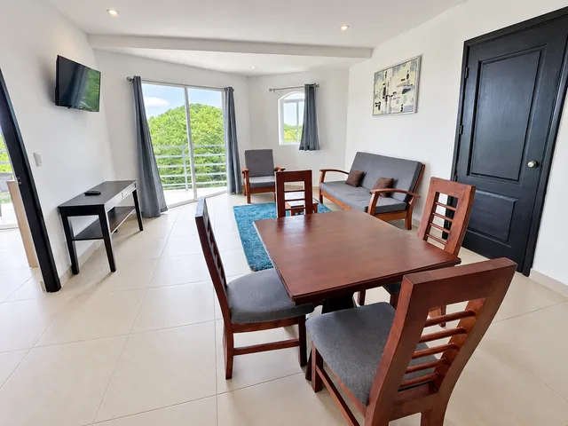 Dining area beside the lounge and interior doors