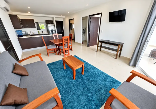 Open-plan living and dining area beside the kitchen