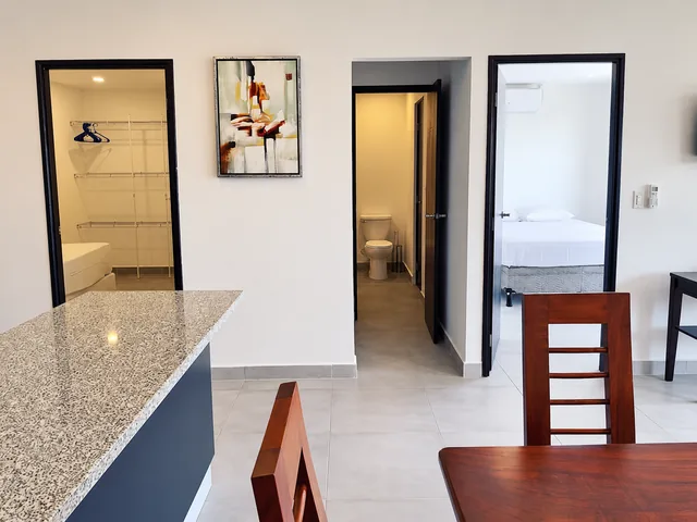 Interior doors connecting the dining area and bedrooms