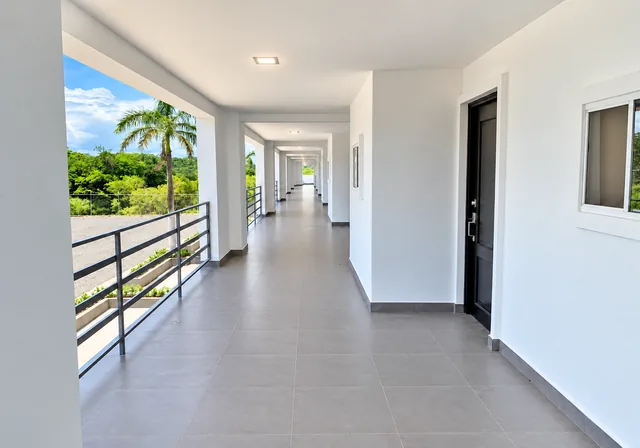 Open-air corridor outside the condos