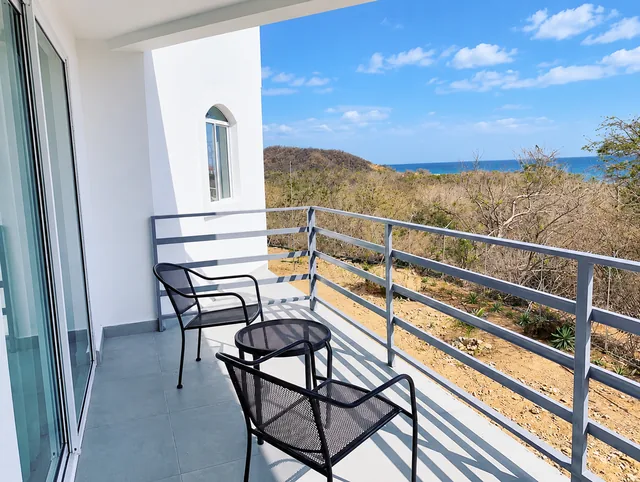Furnished balcony overlooking the Pacific coastline