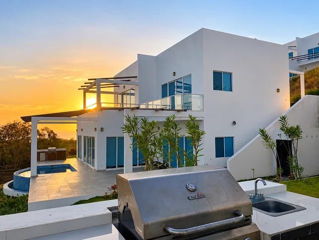 House exterior and tropical garden