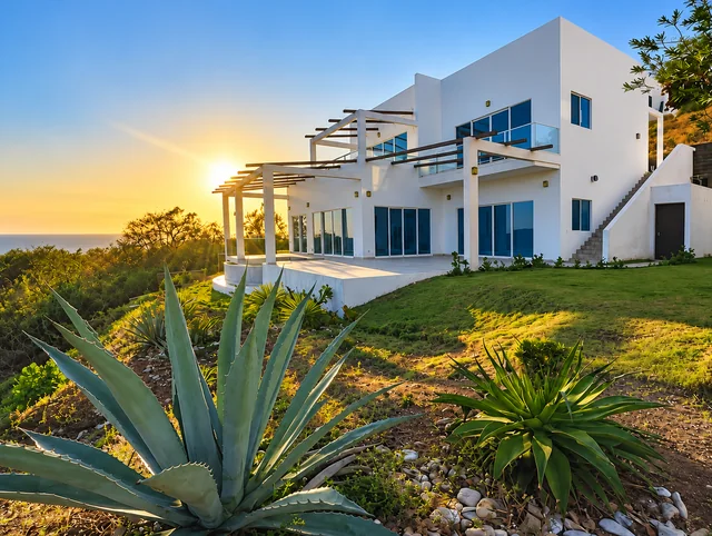 Sunset over the house and garden