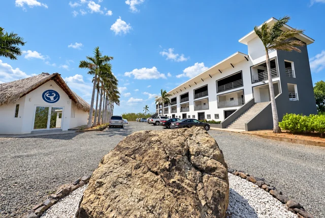 Landscaped entrance beside the condos