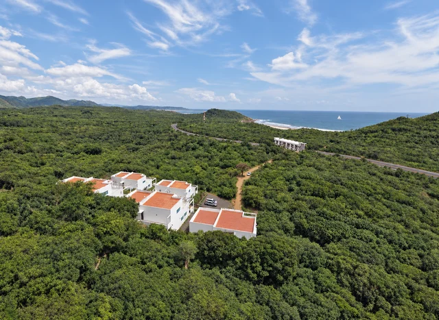 Aerial view of the resort surrounded by greenery