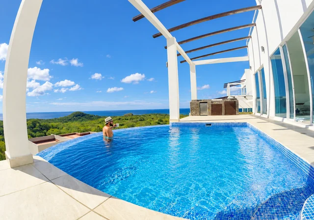 Poolside relaxation at a hillside home