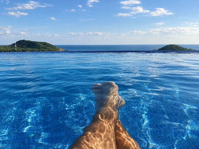 Relaxing in the pool overlooking the ocean