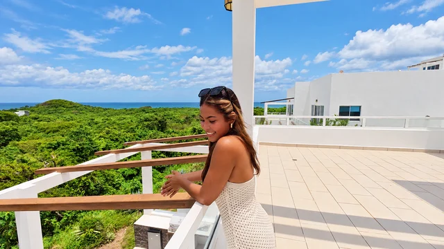 Enjoying the views from a sunny terrace