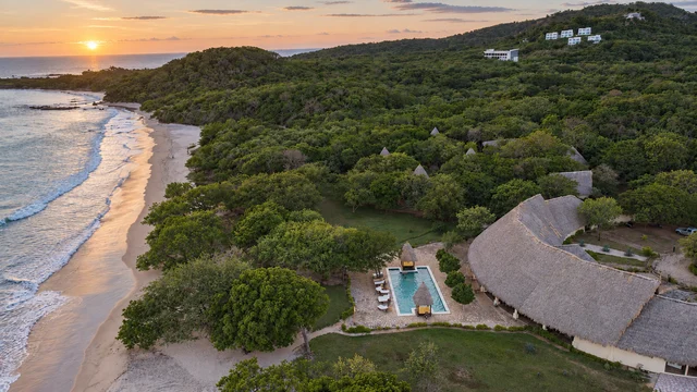 Sunset along the beach below the resort