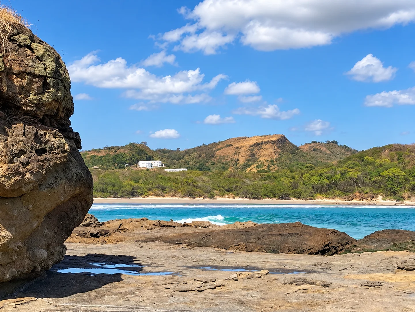 Looking back toward Surf Ranch Popoyo from the rocky shoreline